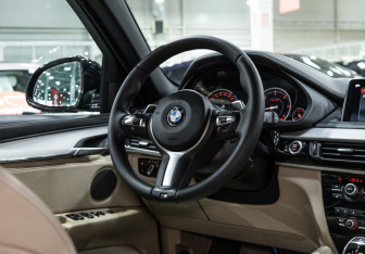 Подержанный автомобиль BMW X6 2018 года (15 фото)