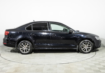 Подержанный автомобиль Volkswagen Jetta Sedan 2013 года (4 фото)