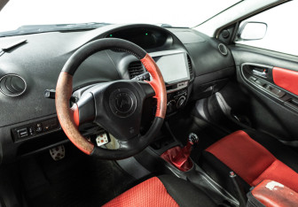 Подержанный автомобиль Geely MK Cross 2013 года (11 фото)