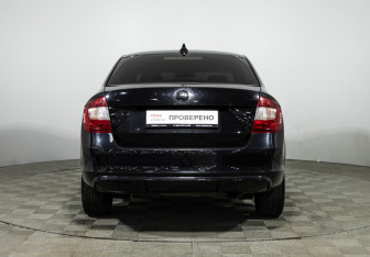 Подержанный автомобиль Skoda Rapid Liftback 2015 года (6 фото)