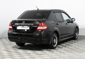 Подержанный автомобиль Nissan Tiida Sedan 2010 года (5 фото)