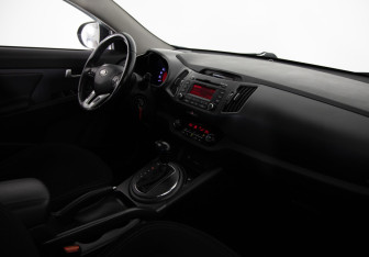 Подержанный автомобиль Kia Sportage 2013 года (11 фото)