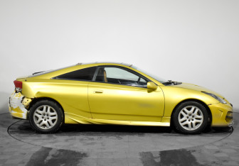 Подержанный автомобиль Toyota Celica Liftback 2002 года (4 фото)
