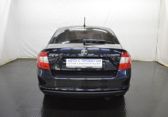 Подержанный автомобиль Skoda Rapid Liftback 2016 года (6 фото)