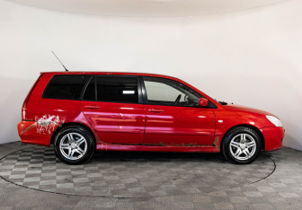 Подержанный автомобиль Mitsubishi Lancer Wagon 2004 года (4 фото)