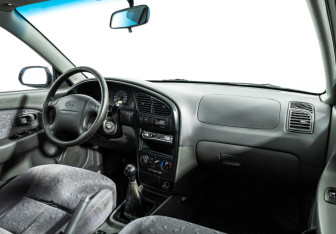 Подержанный автомобиль Kia Spectra Sedan 2007 года (9 фото)