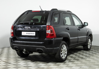 Подержанный автомобиль Kia Sportage 2010 года (5 фото)