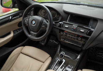 Подержанный автомобиль BMW X4 2014 года (10 фото)