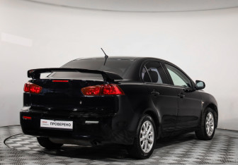 Подержанный автомобиль Mitsubishi Lancer Sedan 2010 года (5 фото)