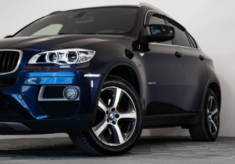 Подержанный автомобиль BMW X6 2013 года (2 фото)
