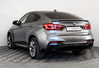 Подержанный автомобиль BMW X6 2018 года (9 фото)