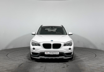Подержанный автомобиль BMW X1 2014 года (2 фото)