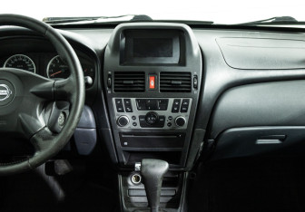 Подержанный автомобиль Nissan Almera Sedan 2004 года (14 фото)