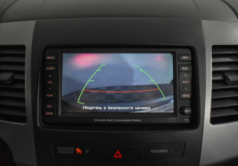 Подержанный автомобиль Mitsubishi Outlander 2011 года (17 фото)
