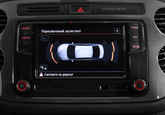 Подержанный автомобиль Volkswagen Tiguan 2013 года (17 фото)