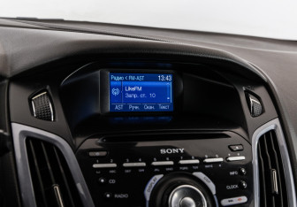 Подержанный автомобиль Ford Focus Wagon 2012 года (14 фото)