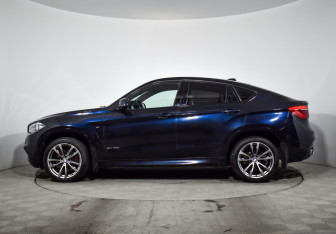 Подержанный автомобиль BMW X6 2016 года (8 фото)
