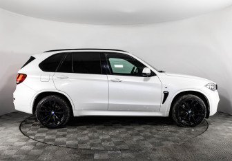 Подержанный автомобиль BMW X5 2015 года (4 фото)