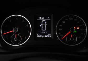 Подержанный автомобиль Volkswagen Tiguan 2015 года (18 фото)