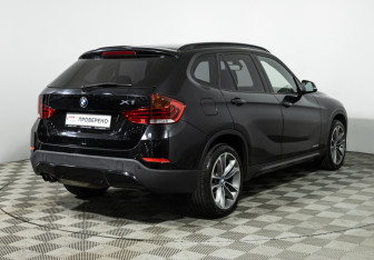 Подержанный автомобиль BMW X1 2013 года (5 фото)