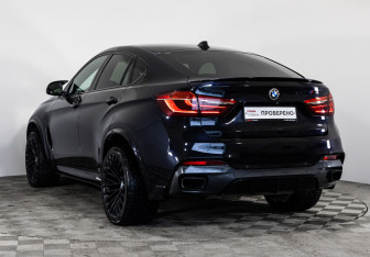 Подержанный автомобиль BMW X6 2015 года (9 фото)