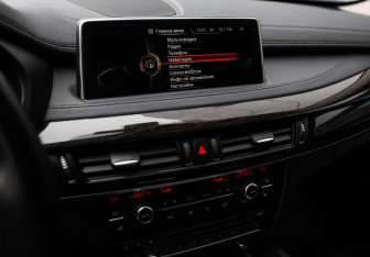 Подержанный автомобиль BMW X6 2016 года (15 фото)