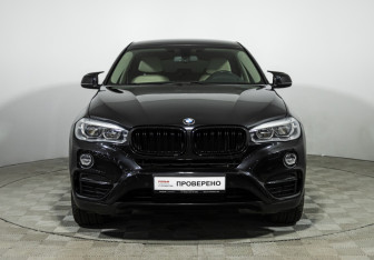 Подержанный автомобиль BMW X6 2015 года (2 фото)