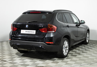 Подержанный автомобиль BMW X1 2013 года (5 фото)