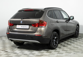 Подержанный автомобиль BMW X1 2011 года (5 фото)