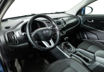 Подержанный автомобиль Kia Sportage 2013 года (11 фото)