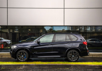 Подержанный автомобиль BMW X5 2016 года (9 фото)