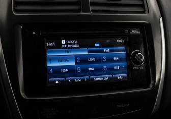 Подержанный автомобиль Mitsubishi ASX 2013 года (14 фото)