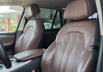 Подержанный автомобиль BMW X5 2014 года (10 фото)