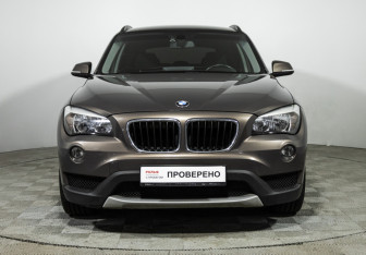Подержанный автомобиль BMW X1 2013 года (2 фото)