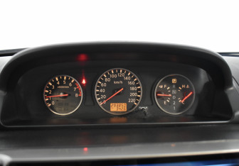 Подержанный автомобиль Nissan X-Trail 2003 года (14 фото)