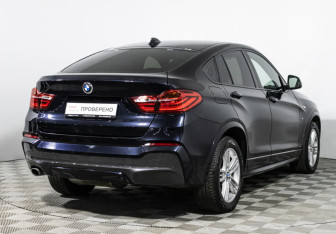 Подержанный автомобиль BMW X4 2016 года (5 фото)