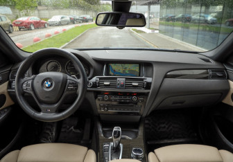 Подержанный автомобиль BMW X4 2014 года (11 фото)