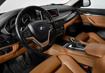 Подержанный автомобиль BMW X6 2016 года (9 фото)