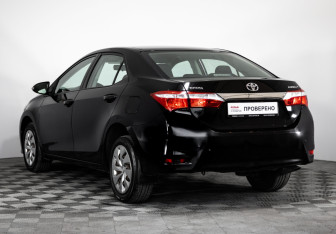 Подержанный автомобиль Toyota Corolla Sedan 2014 года (6 фото)