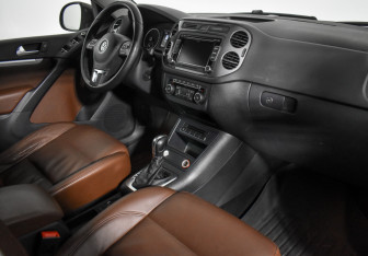 Подержанный автомобиль Volkswagen Tiguan 2014 года (12 фото)