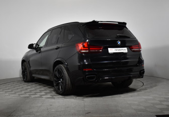 Подержанный автомобиль BMW X5 2014 года (7 фото)