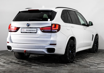 Подержанный автомобиль BMW X5 2015 года (5 фото)