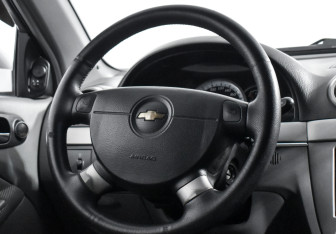 Подержанный автомобиль Chevrolet Lacetti Hatchback 2011 года (14 фото)