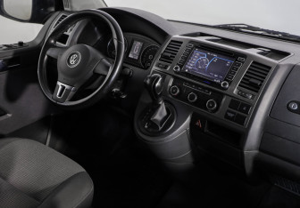 Подержанный автомобиль Volkswagen Caravelle 2013 года (9 фото)