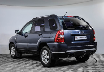Подержанный автомобиль Kia Sportage 2010 года (7 фото)