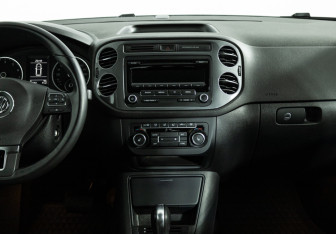 Подержанный автомобиль Volkswagen Tiguan 2014 года (14 фото)