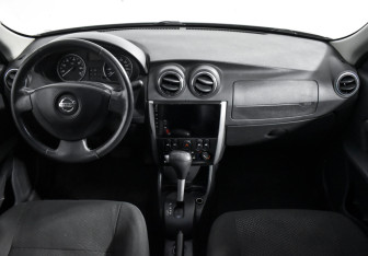 Подержанный автомобиль Nissan Almera Sedan 2013 года (13 фото)
