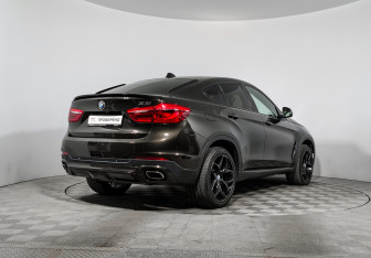 Подержанный автомобиль BMW X6 2015 года (5 фото)