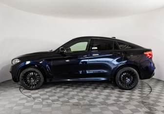 Подержанный автомобиль BMW X6 2015 года (9 фото)