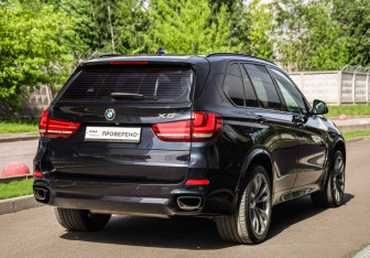 Подержанный автомобиль BMW X5 2016 года (6 фото)